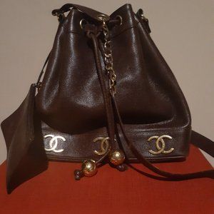 Chanel brown and gold CC drawstring shoulder bag